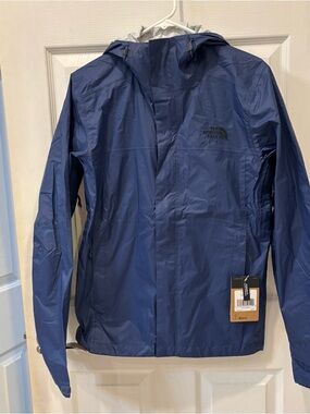 The North Face navy blue hooded windbreaker jacket